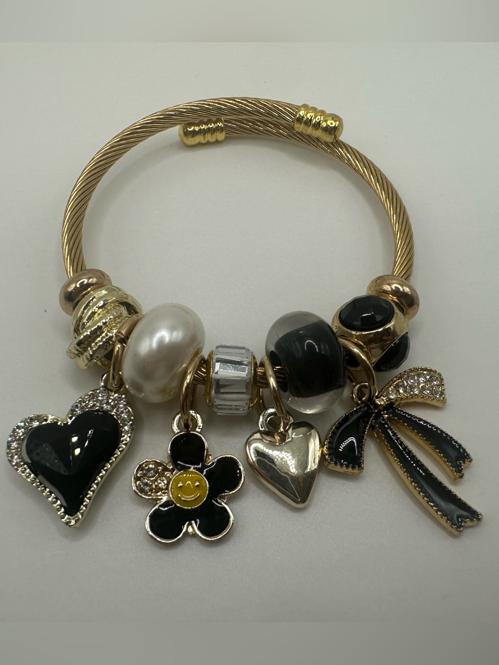 Kids Gold-Tone Charm Bangle Bracelet with Black Enamel and Pearl Accents